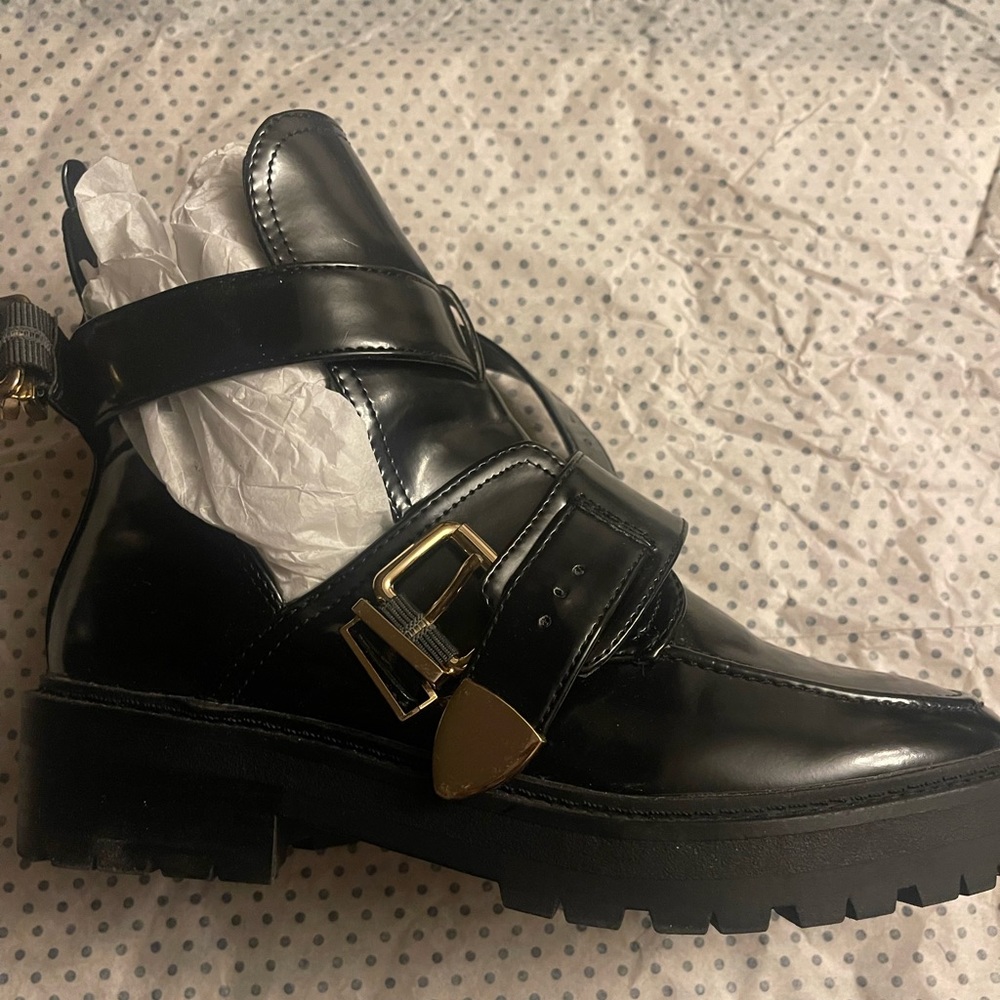 Black chunky boot with belt buckles
